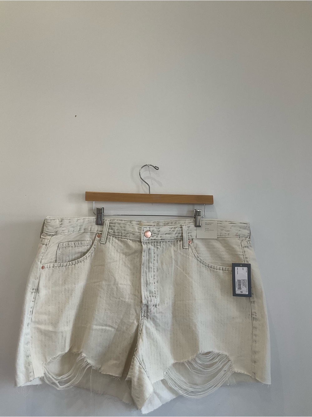 Universal Standard Washed White Distressed Denim Cutoff Shorts